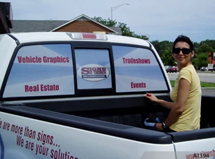 Vehicle Wrap with Perforated Vinyl for Rear Windows