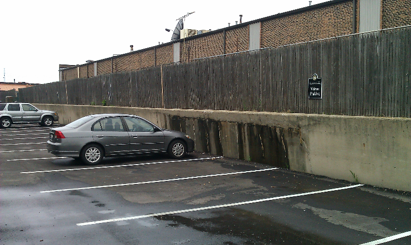 Parking Signs along Fence