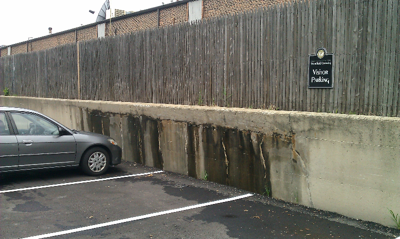 Parking Signs along Fence