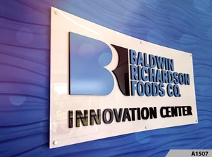 3 Dimensional Acrylic Logo Signs installed on Brushed Silver Aluminum Sign Panels, installed with Decorative Stand-off Screws,Baldwin Richardson Foods Co. in Westmont, IL 
