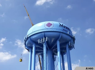 It takes a special vinyl to apply the digitally printed Centennial Logo to the Mt. Prospect Water Tower, we got it done!