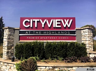 Illuminated Channel Letters mounted to Metal Cabinet Sign | City View at the Highlands in Lombard