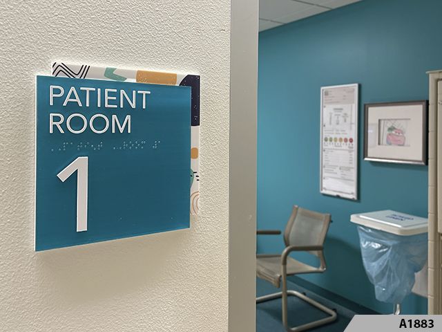 ADA Signs can be modern and creative and even matching other decorative designs and displays