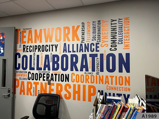 Word Cloud signages printed on vinyl, custom cut and installed as wall graphics in Conference Room
