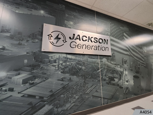 If you have a long, boring, empty wall, why not spruce it up with graphics that turn your business into an art gallery or museum.