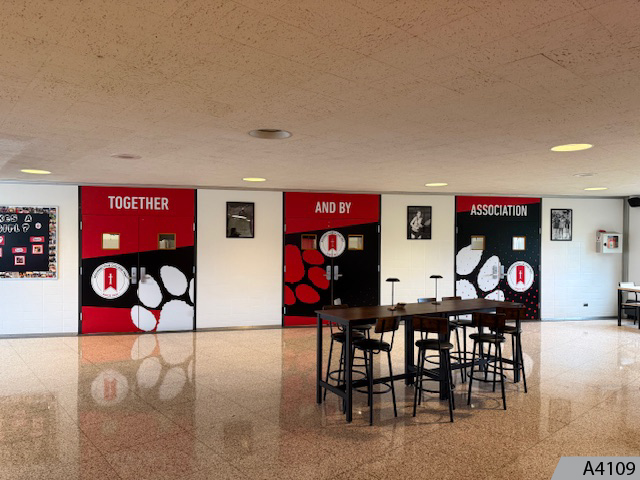 Don't let unsightly old doors ruin the school asthetics, and wrap them in vinyl graphics.