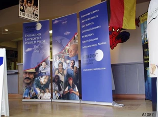 Using 3 Retractable Banner Stands to convey one great message and one large graphic statistic