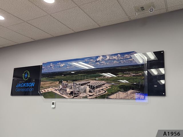 Layered Acrylic panels, backprinted graphics, blind-mount or hidden hardware installation to give it this real nice looking floating appearance