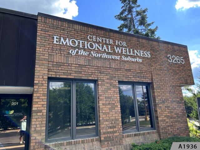 Sometimes all you need is legibility, and white letters on brick show up the best for your business name.