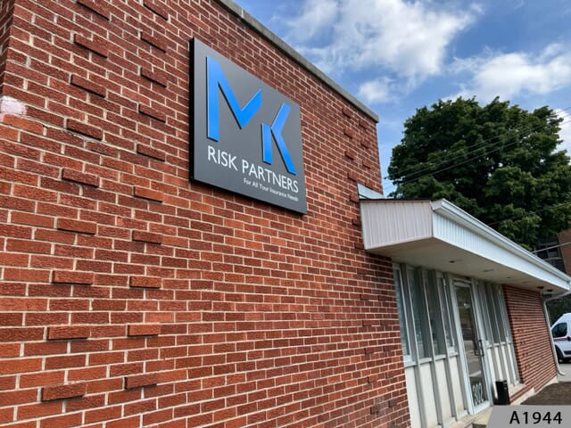 Dimensional logo on an aluminum panel panface is a great way to showcase your brand.