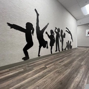 custom-shaped 3-dimensional silhouette wall graphics serve as more than just decorative elements—they are tools for creating immersive environments that connect people to the unique identity and atmosphere of the educational institution.