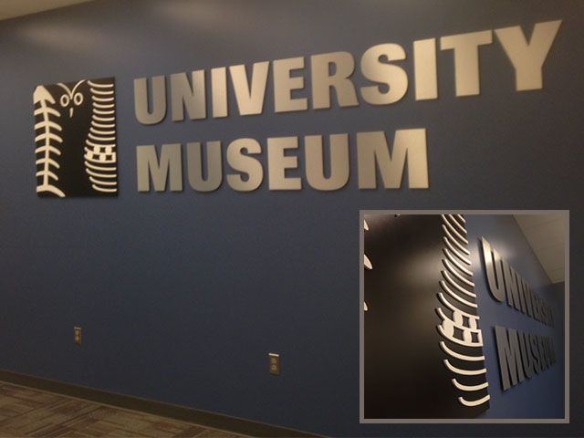 Silver and Black Logo and Lettering