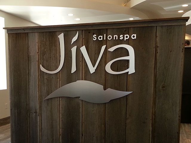 Silver Cut Logo on Wood