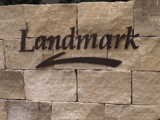 Cut Acrylic Logo on Stone