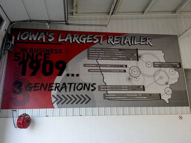 Sign hung in a Garage Bay