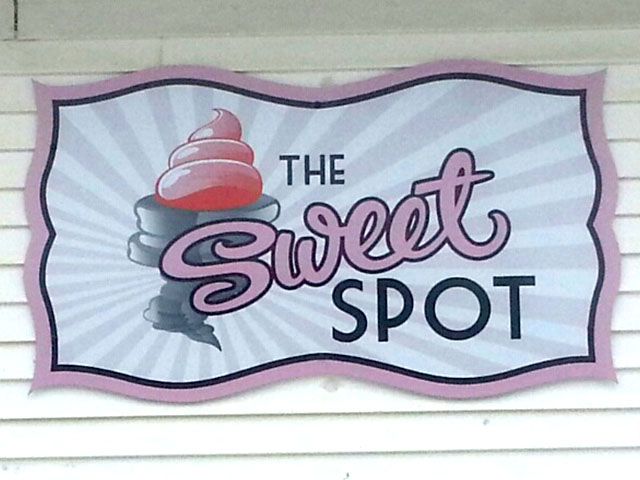 Metal Sign on Aluminum Siding