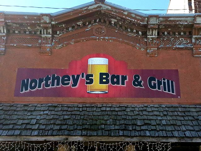 2 Layer Metal Sign on Remodeled Building