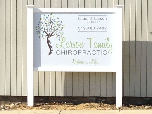 PVC Sign Placed Next to Building