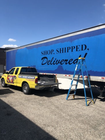 Vehicle Lettering - Black Vinyl on side of 54 Trailer