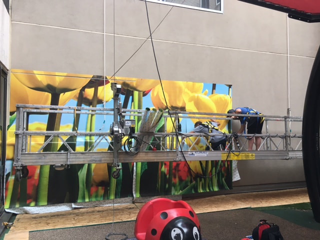Installation of Full Color Digitally Printed Outdoor Vinyl Wall Graphic