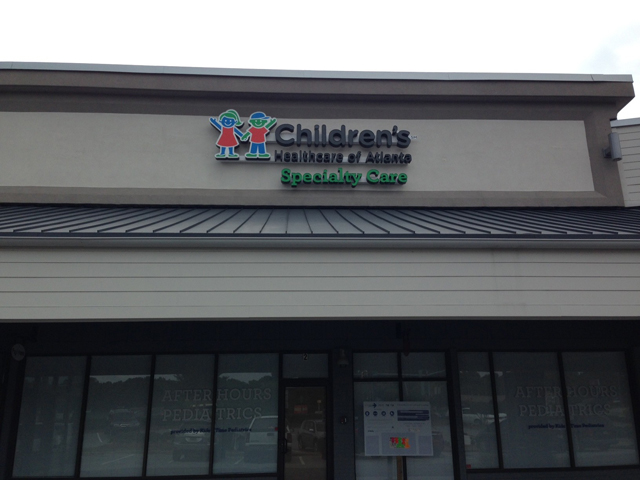 Lighted Channel letters on a Raceway Building Sign