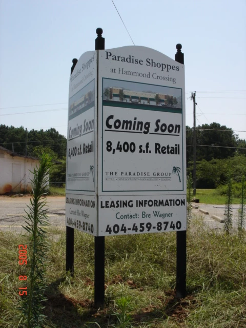 coming soon real estate sign