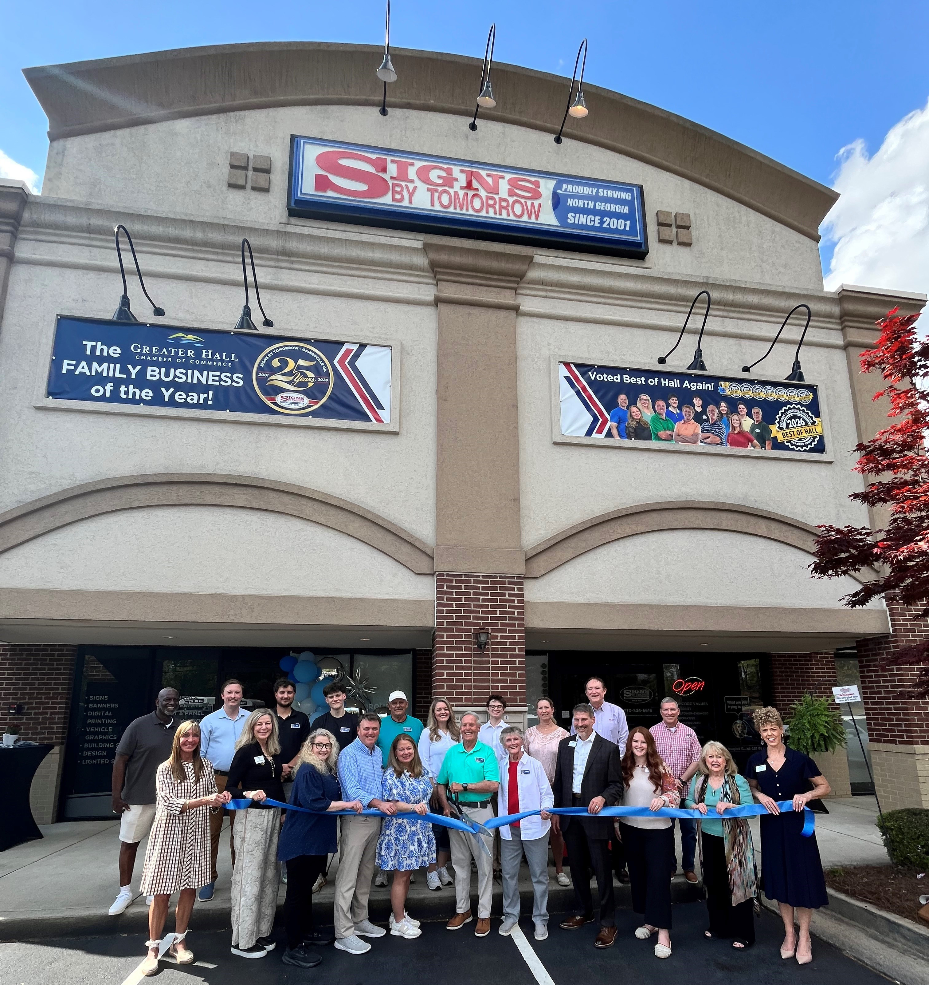 25th party ribbon cutting